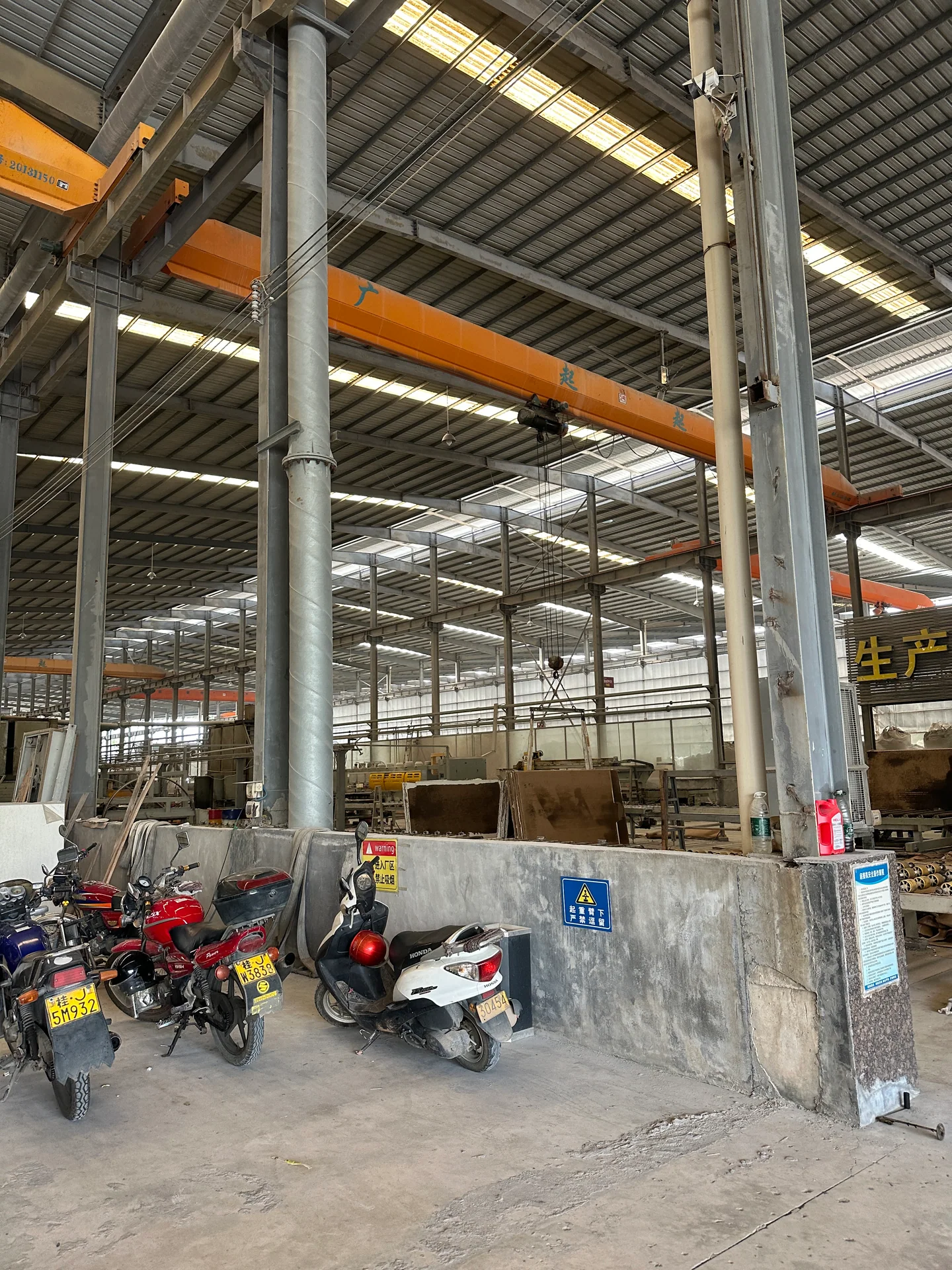 Foshan building material factory production floor reviewed during supplier sourcing